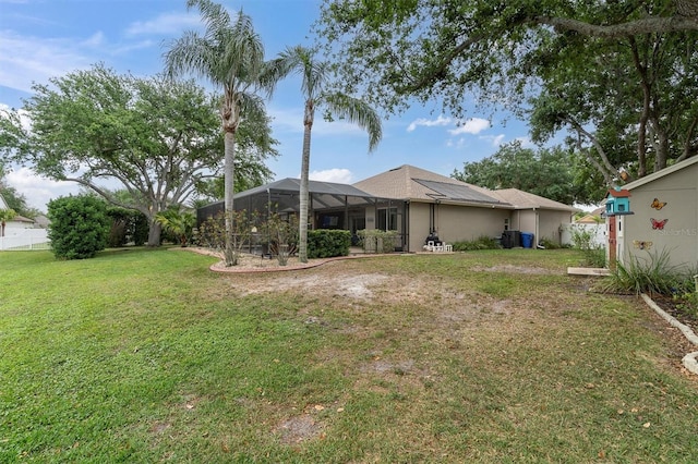 12304 Freesia Ct, Riverview, FL 33569 - view of yard featuring a lanai and fence