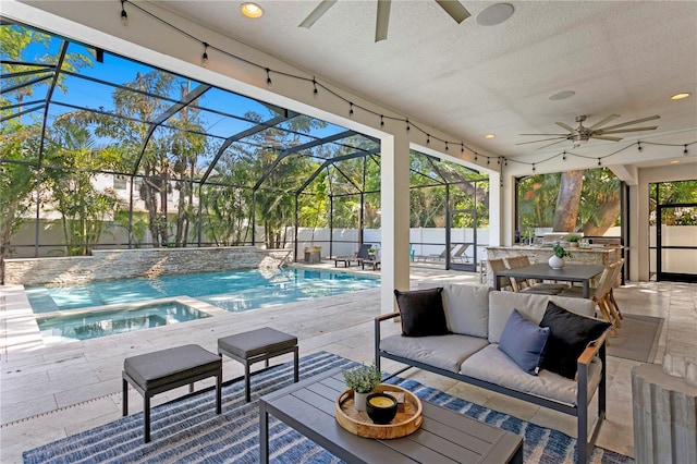 view of pool with a lanai, an outdoor living space, outdoor dining space, an in ground hot tub, and a patio area