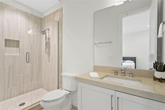 full bath with toilet, vanity, ensuite bath, and a shower stall