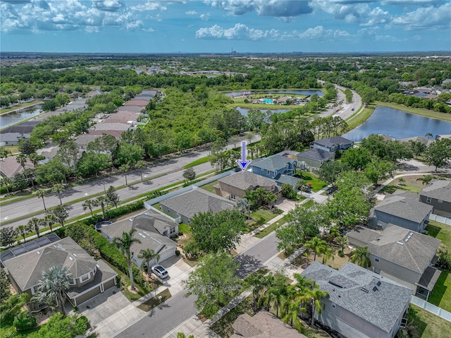aerial view with a water view and a residential view