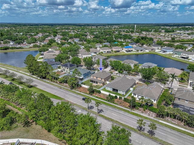 aerial view with a water view and a residential view