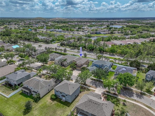 aerial view featuring a water view and a residential view