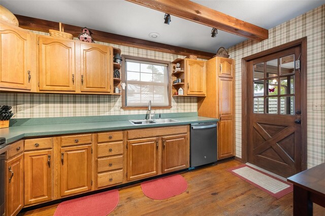 kitchen featuring wallpapered walls, light wood-style flooring, open shelves, stainless steel dishwasher, and a sink