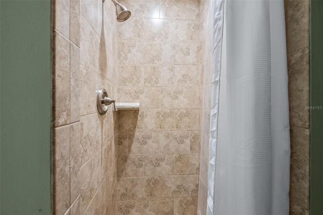 details featuring a tile shower