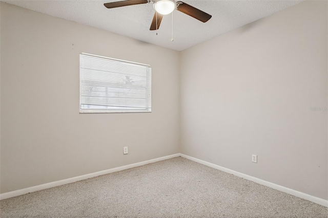 14013 Briardale Ln, Tampa, FL 33618 - spare room featuring carpet flooring, baseboards, and a ceiling fan