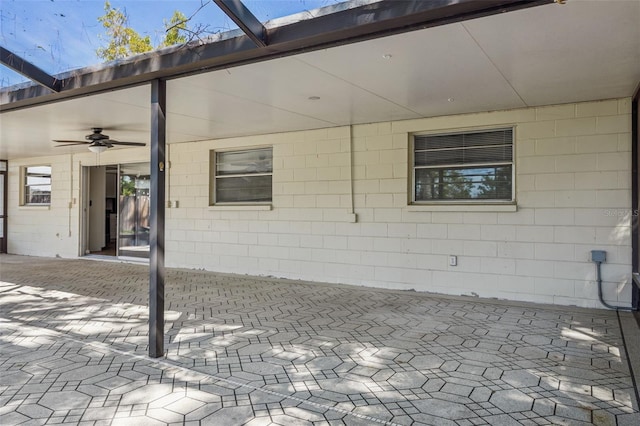 14013 Briardale Ln, Tampa, FL 33618 - view of patio / terrace with ceiling fan and glass enclosure