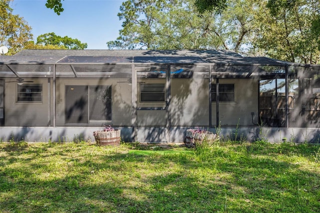14013 Briardale Ln, Tampa, FL 33618 - back of property featuring a lanai and a lawn
