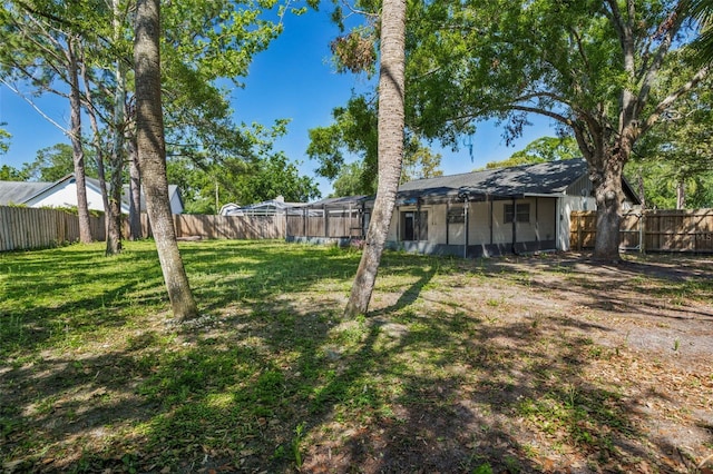 14013 Briardale Ln, Tampa, FL 33618 - view of yard with a lanai and a fenced backyard