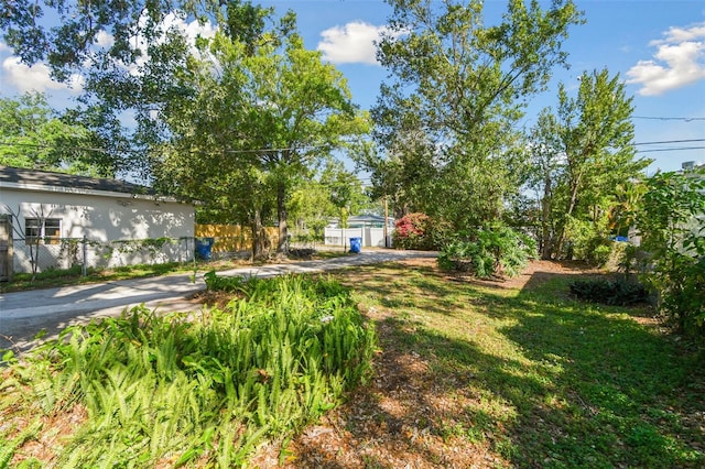view of yard with fence