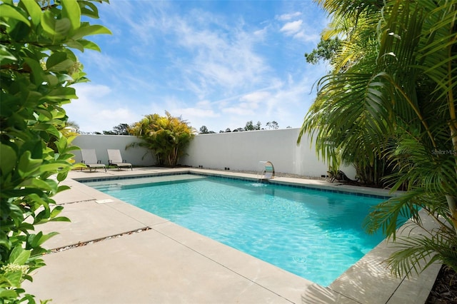 7608 Antilla St, Tampa, FL 33625 - view of pool featuring a fenced backyard, a patio area, and a fenced in pool