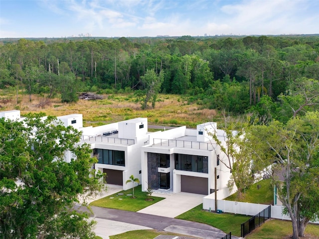 7608 Antilla St, Tampa, FL 33625 - drone / aerial view featuring a wooded view