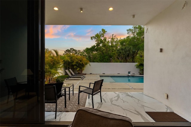 7608 Antilla St, Tampa, FL 33625 - view of patio / terrace featuring a fenced in pool