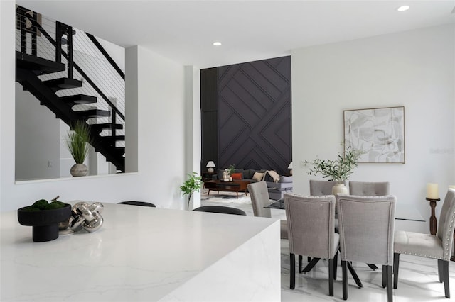 7608 Antilla St, Tampa, FL 33625 - dining room with marble finish floor, recessed lighting, and stairway