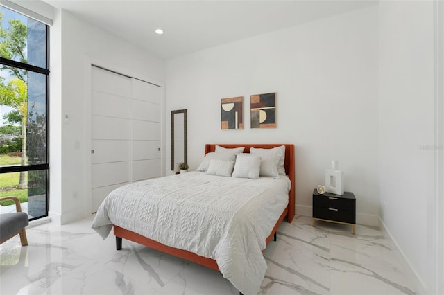 7608 Antilla St, Tampa, FL 33625 - bedroom featuring marble finish floor, baseboards, and recessed lighting