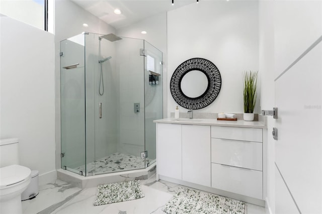 7608 Antilla St, Tampa, FL 33625 - bathroom with toilet, vanity, a shower stall, marble finish floor, and recessed lighting