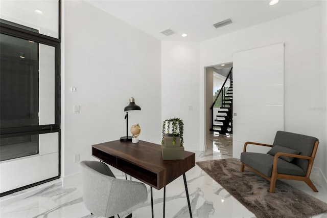 7608 Antilla St, Tampa, FL 33625 - home office with marble finish floor, recessed lighting, baseboards, and visible vents