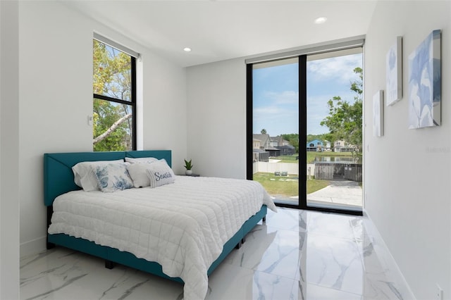 7608 Antilla St, Tampa, FL 33625 - bedroom with baseboards, marble finish floor, access to exterior, and recessed lighting