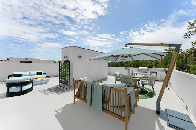 7608 Antilla St, Tampa, FL 33625 - view of patio / terrace featuring a grill, an outdoor living space, and an outdoor kitchen