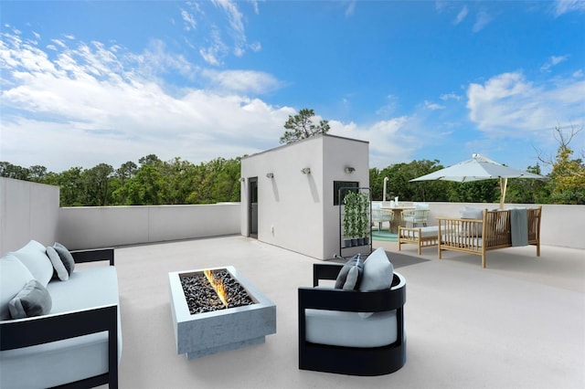 7608 Antilla St, Tampa, FL 33625 - view of patio with fence and an outdoor living space with a fire pit