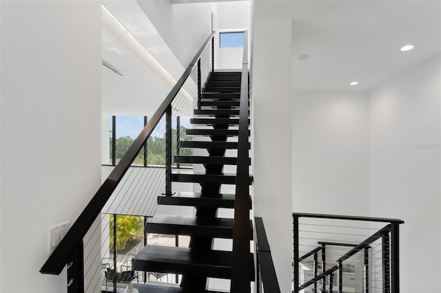 7608 Antilla St, Tampa, FL 33625 - stairs with recessed lighting
