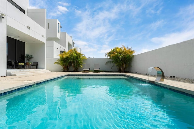 7608 Antilla St, Tampa, FL 33625 - view of swimming pool featuring a fenced in pool and a patio area