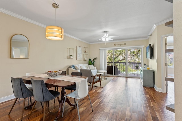 1002 S Harbour Island Blvd Unit 1312, Tampa, FL 33602 - dining room with baseboards, wood finished floors, ornamental molding, and a ceiling fan