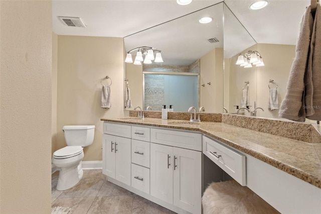 1002 S Harbour Island Blvd Unit 1312, Tampa, FL 33602 - full bathroom with toilet, a shower stall, a sink, visible vents, and a notable chandelier