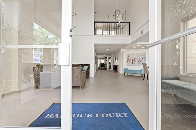 1002 S Harbour Island Blvd Unit 1312, Tampa, FL 33602 - foyer entrance with a high ceiling, a chandelier, and visible vents