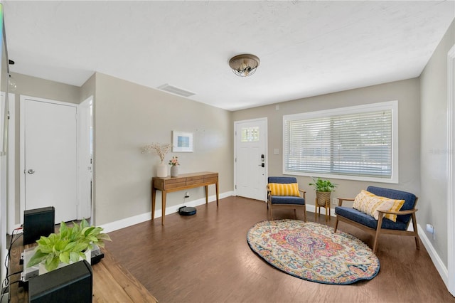 5367 5th Ave N, Saint Petersburg, FL 33710 - entryway with baseboards, visible vents, and wood finished floors
