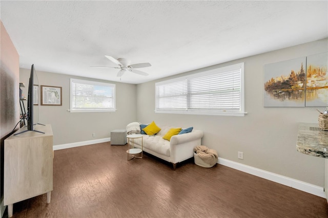 5367 5th Ave N, Saint Petersburg, FL 33710 - sitting room with a textured ceiling, baseboards, ceiling fan, and wood finished floors