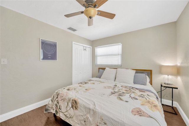 5367 5th Ave N, Saint Petersburg, FL 33710 - bedroom featuring baseboards, visible vents, a ceiling fan, a closet, and wood finished floors