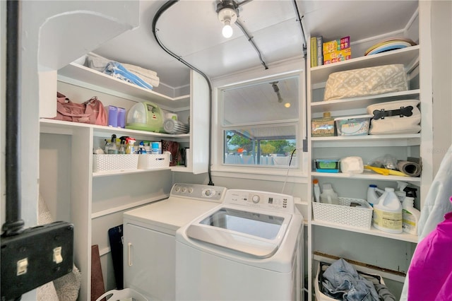 5367 5th Ave N, Saint Petersburg, FL 33710 - laundry room featuring washing machine and dryer and laundry area