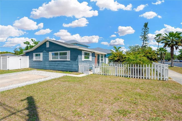 5367 5th Ave N, Saint Petersburg, FL 33710 - single story home with a gate, a fenced front yard, and a front lawn