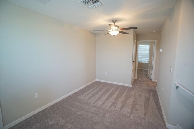 1038 Ocean Spray Dr, Ruskin, FL 33570 - carpeted empty room with ceiling fan and baseboards