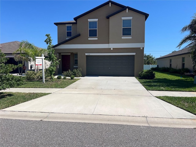 1038 Ocean Spray Dr, Ruskin, FL 33570 - traditional-style house with stucco siding, a garage, driveway, and a front lawn