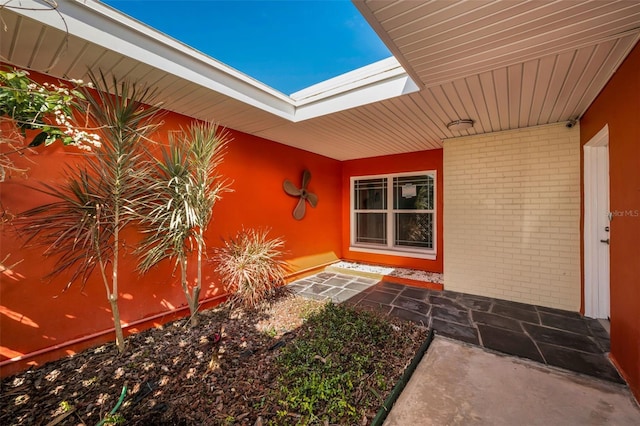 366 La Hacienda Dr, Indian Rocks Beach, FL 33785 - entrance to property featuring brick siding