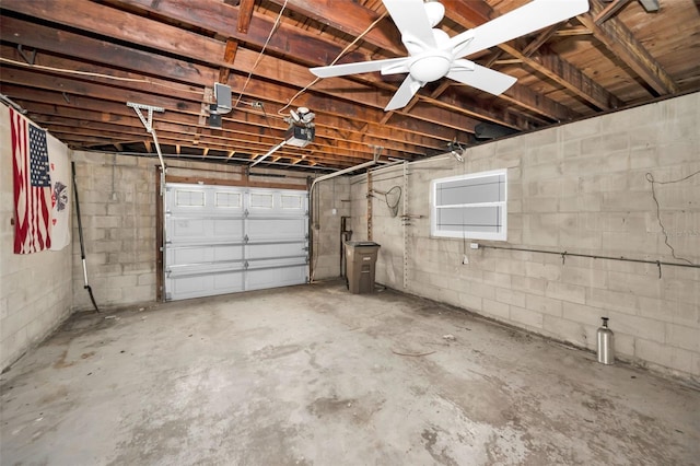 366 La Hacienda Dr, Indian Rocks Beach, FL 33785 - garage with concrete block wall and a garage door opener