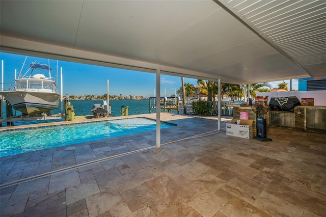 366 La Hacienda Dr, Indian Rocks Beach, FL 33785 - view of pool with a boat dock, boat lift, a water view, and a patio area