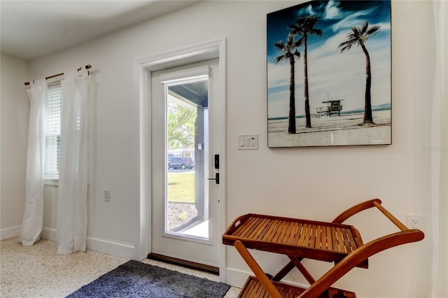 2488 Del Rio Way, Dunedin, FL 34698 - entrance foyer with baseboards and speckle patterned floor