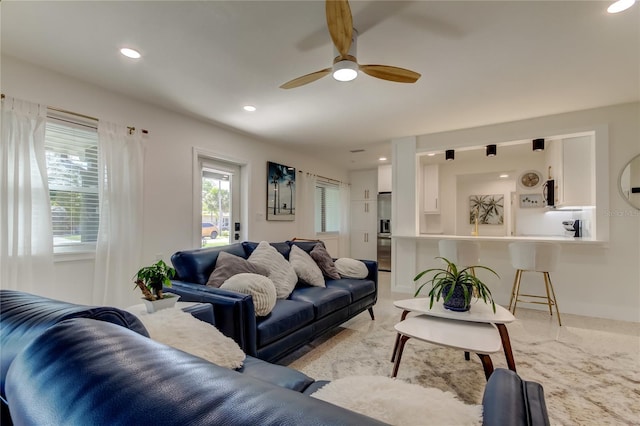 2488 Del Rio Way, Dunedin, FL 34698 - living area with ceiling fan, light carpet, and recessed lighting