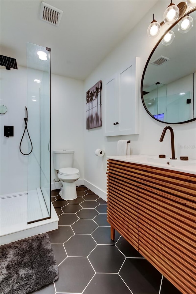 2488 Del Rio Way, Dunedin, FL 34698 - full bath with a shower stall, vanity, toilet, and baseboards