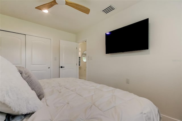 2488 Del Rio Way, Dunedin, FL 34698 - bedroom with a closet, a ceiling fan, and baseboards