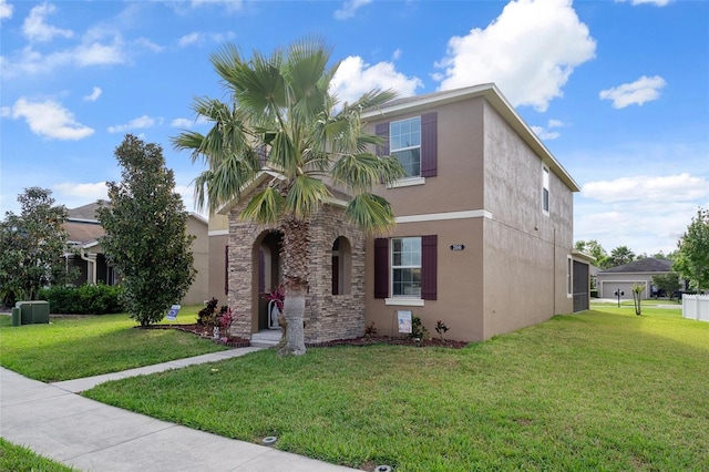 21046 Passive Porch Dr, Land O Lakes, FL 34637 - view of front of property with stucco siding, a front lawn, and stone siding
