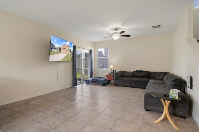 21046 Passive Porch Dr, Land O Lakes, FL 34637 - living room featuring baseboards, ceiling fan, visible vents, and light tile patterned floors