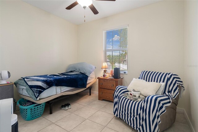 21046 Passive Porch Dr, Land O Lakes, FL 34637 - bedroom featuring baseboards, ceiling fan, and light tile patterned flooring