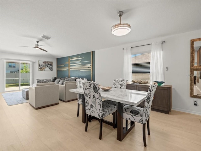 9617 Branching Ship Trce, Wesley Chapel, FL 33545 - dining space featuring ceiling fan, a textured ceiling, visible vents, and light wood-type flooring