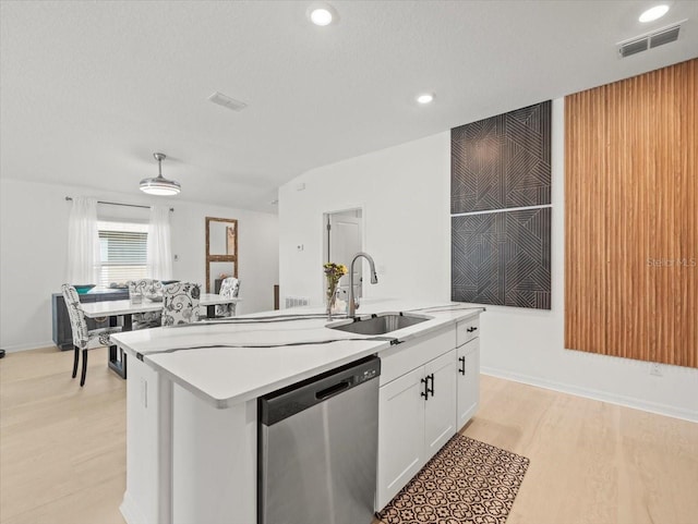9617 Branching Ship Trce, Wesley Chapel, FL 33545 - kitchen featuring white cabinets, dishwasher, visible vents, and a sink