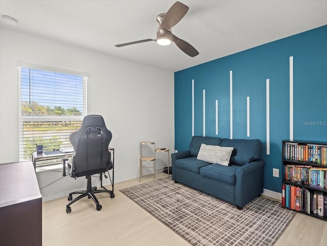 9617 Branching Ship Trce, Wesley Chapel, FL 33545 - office area featuring wood finished floors, baseboards, and ceiling fan