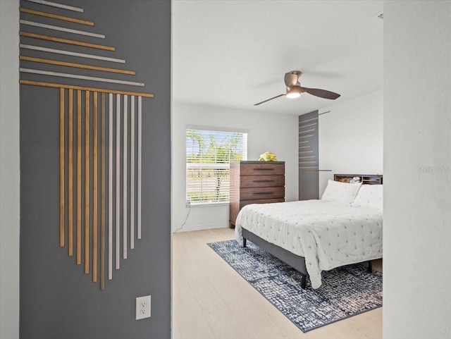 9617 Branching Ship Trce, Wesley Chapel, FL 33545 - bedroom featuring ceiling fan and wood finished floors