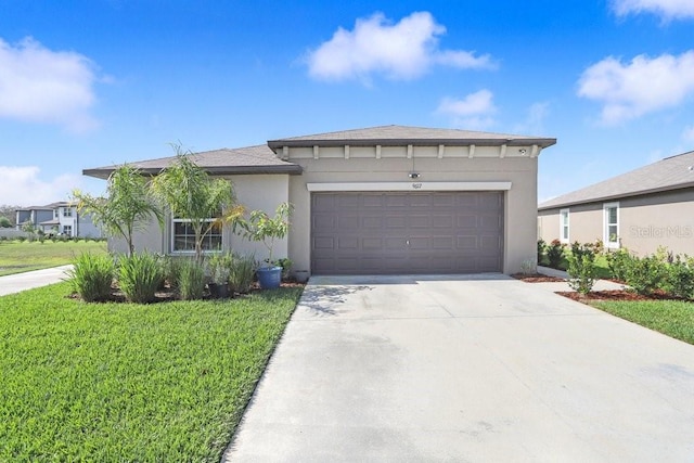 9617 Branching Ship Trce, Wesley Chapel, FL 33545 - prairie-style home with an attached garage, concrete driveway, a front yard, and stucco siding